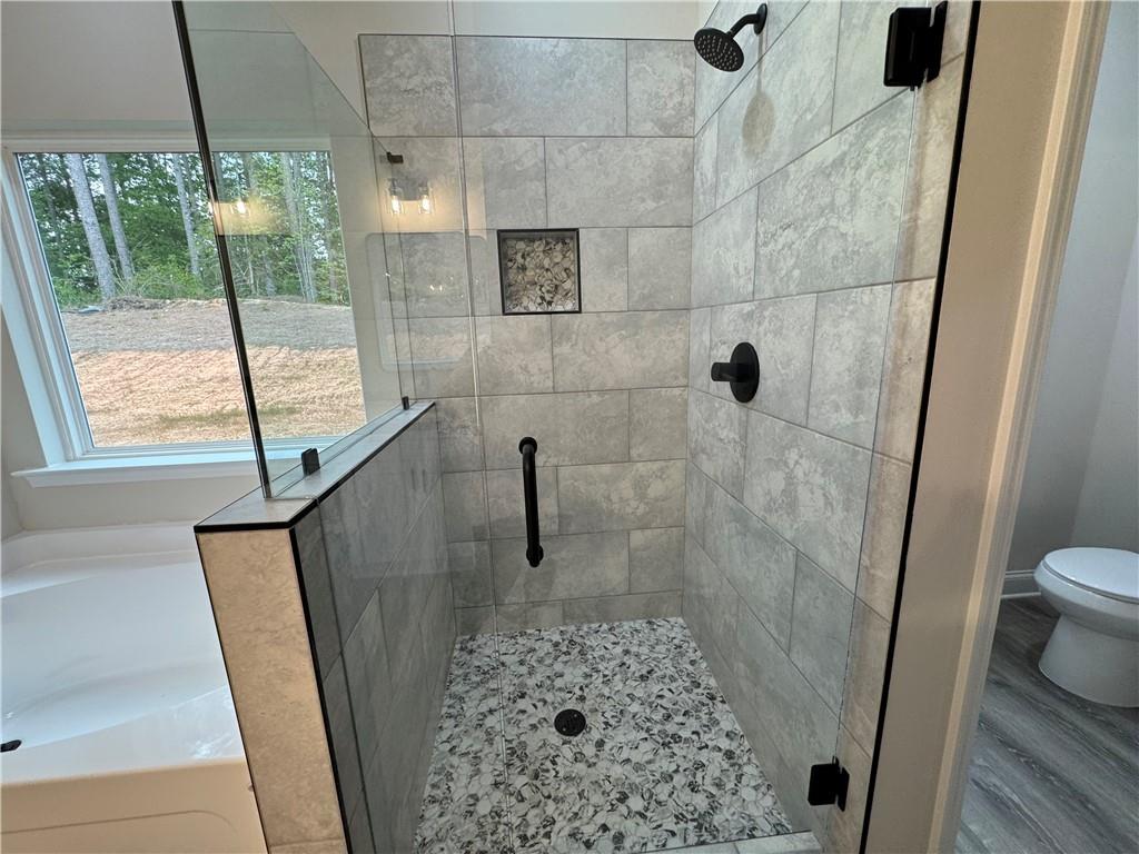 2113 North Hicks Road Toccoa, GA 30577 - Photo 14 of 28 a bathroom with a sink and toilet