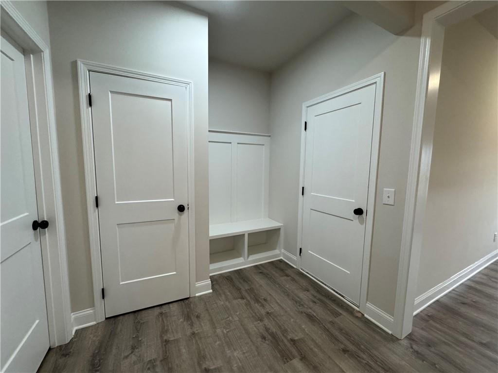 2113 North Hicks Road Toccoa, GA 30577 - Photo 19 of 28 a view of an empty room with wooden floor and closet