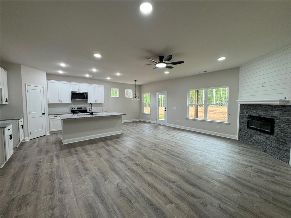 2113 North Hicks Road Toccoa, GA 30577 - Photo 5 of 28 a view of kitchen with cabinets and wooden floor