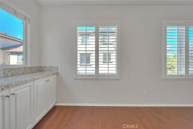 a bathroom with a shower a toilet and a sink