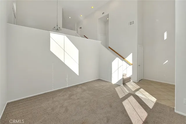 a view of empty room with windows