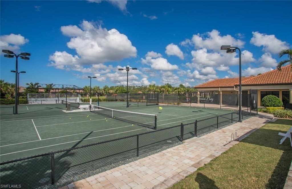 9566 Trevi Court, Unit 4943 Naples, FL 34113 - Photo 27 of 33 a view of a basketball court