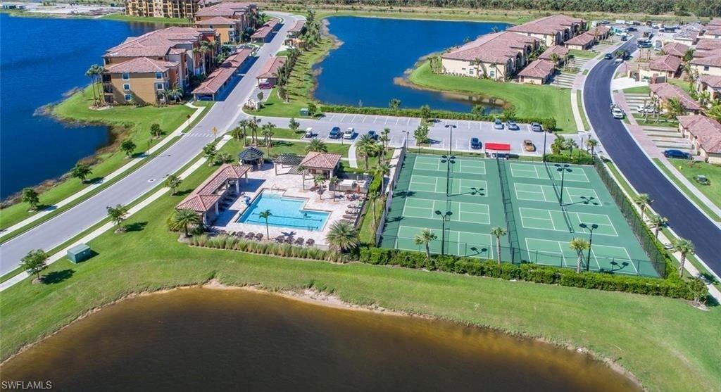 9566 Trevi Court, Unit 4943 Naples, FL 34113 - Photo 28 of 33 a view of a play ground