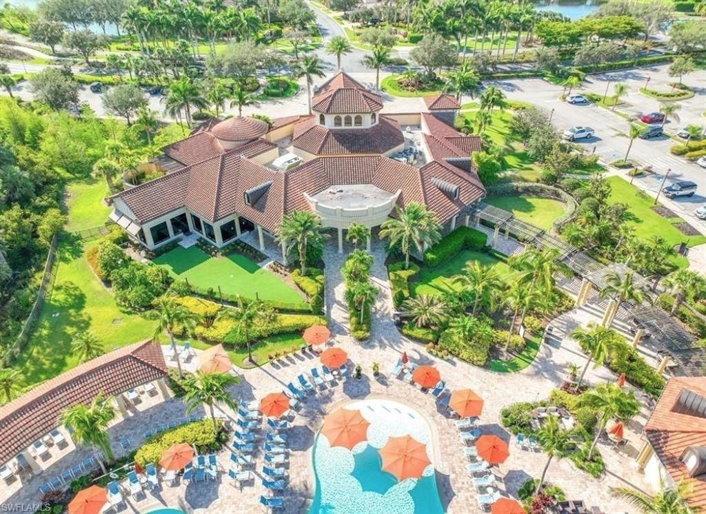 9566 Trevi Court, Unit 4943 Naples, FL 34113 - Photo 30 of 33 a view of a flower in a garden