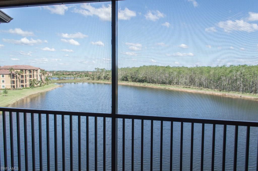 9566 Trevi Court, Unit 4943 Naples, FL 34113 - Photo 7 of 47 a balcony with an ocean view