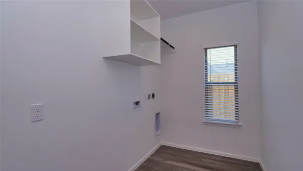 a view of a room that has a window in it