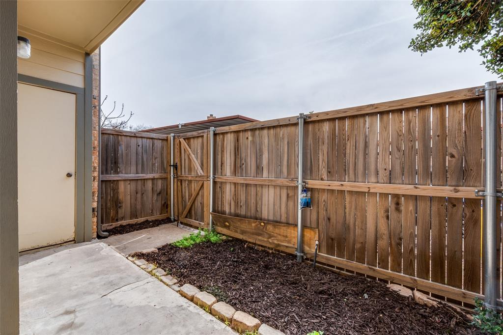 11655 Audelia Road, Unit 901 Dallas, TX 75243 - Photo 23 of 23 a view of a wooden fence