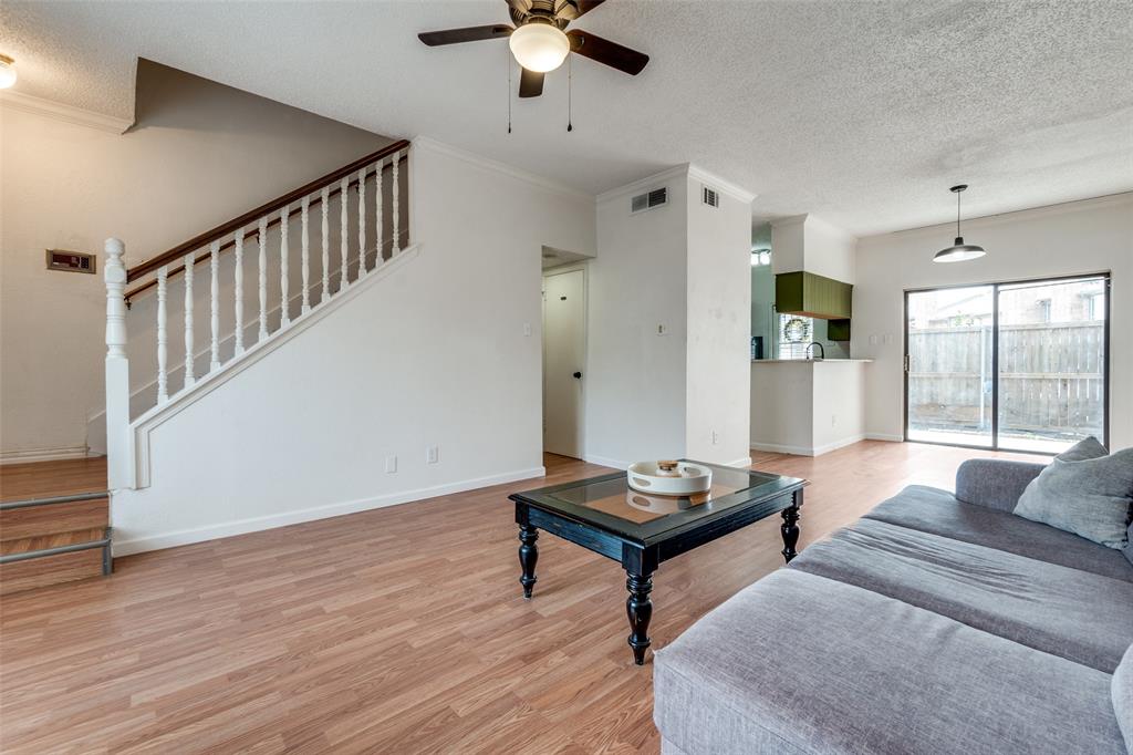 11655 Audelia Road, Unit 901 Dallas, TX 75243 - Photo 7 of 23 a living room with furniture and a window
