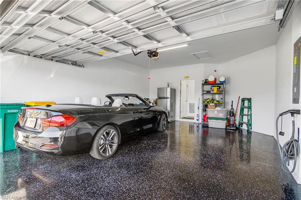 2215 Dragonfruit Way Naples, FL 34120 - Photo 28 of 30 a car in a garage
