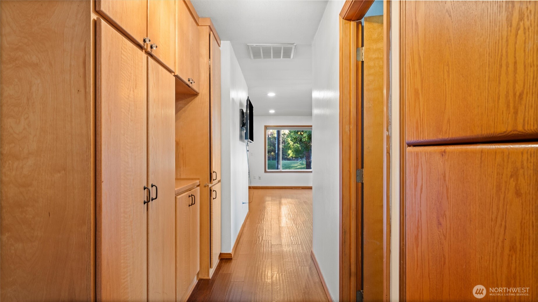 106 Wolf Ridge Lane Dayton, WA 99328 - Photo 16 of 39 a view of a hallway with wooden floor and staircase