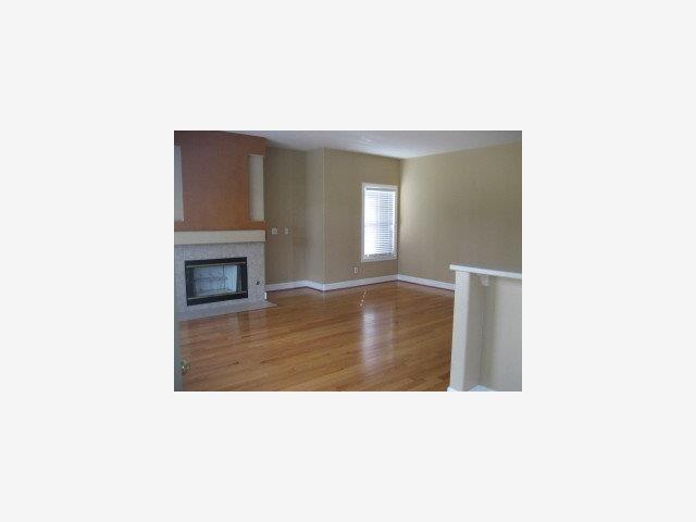 1133 Apache Court Gilroy, CA 95020 - Photo 5 of 7 a living room with a couch and a fireplace