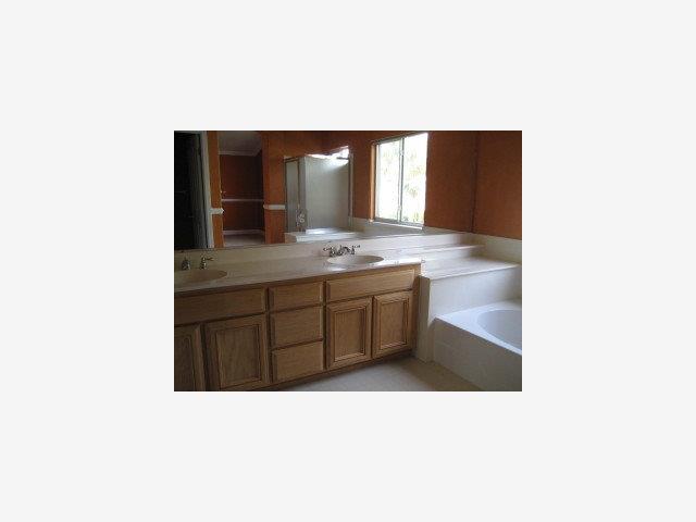 1133 Apache Court Gilroy, CA 95020 - Photo 7 of 7 a open kitchen with a sink and a mirror