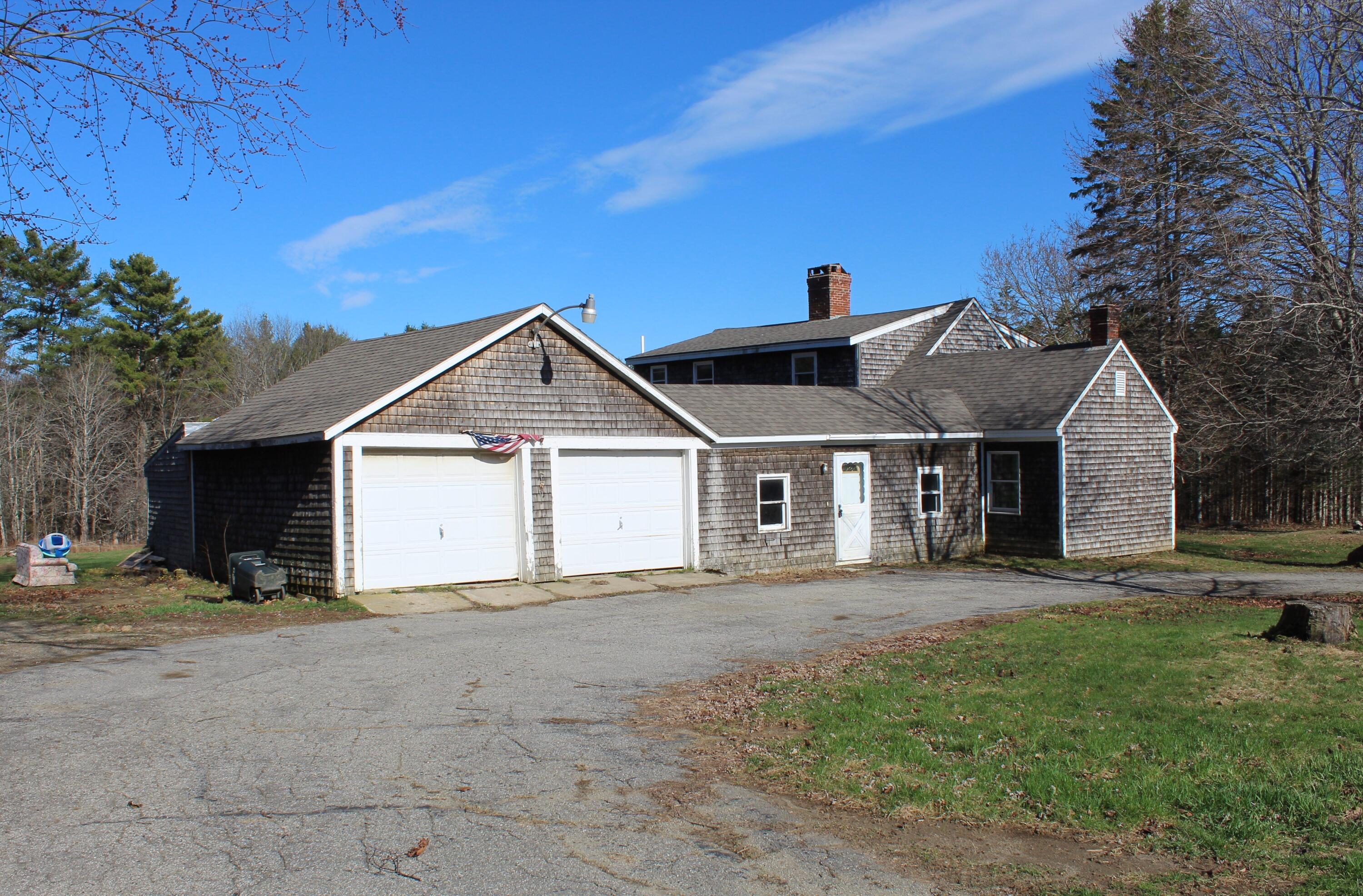 137 Clark Road Prospect, ME 04981 - Photo 2 of 44 garage side 4 16