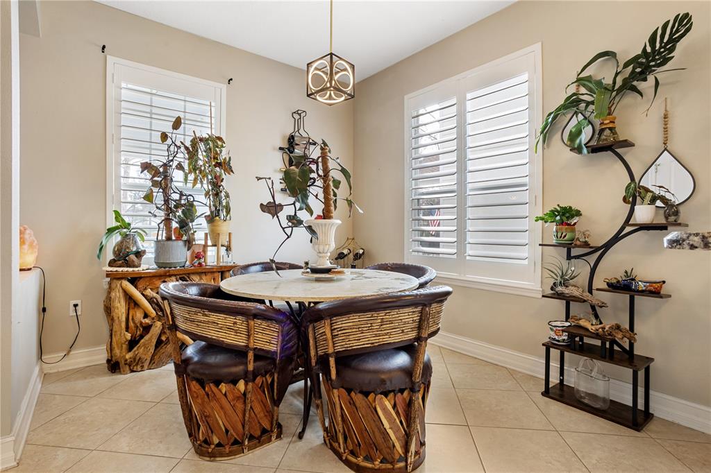 6911 Beargrass Road Harmony, FL 34773 - Photo 12 of 60 a view of a livingroom with furniture and window