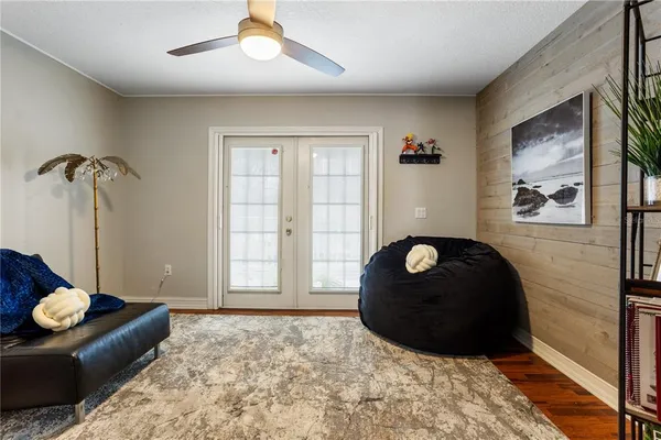 a bathroom with a toilet a sink and a mirror
