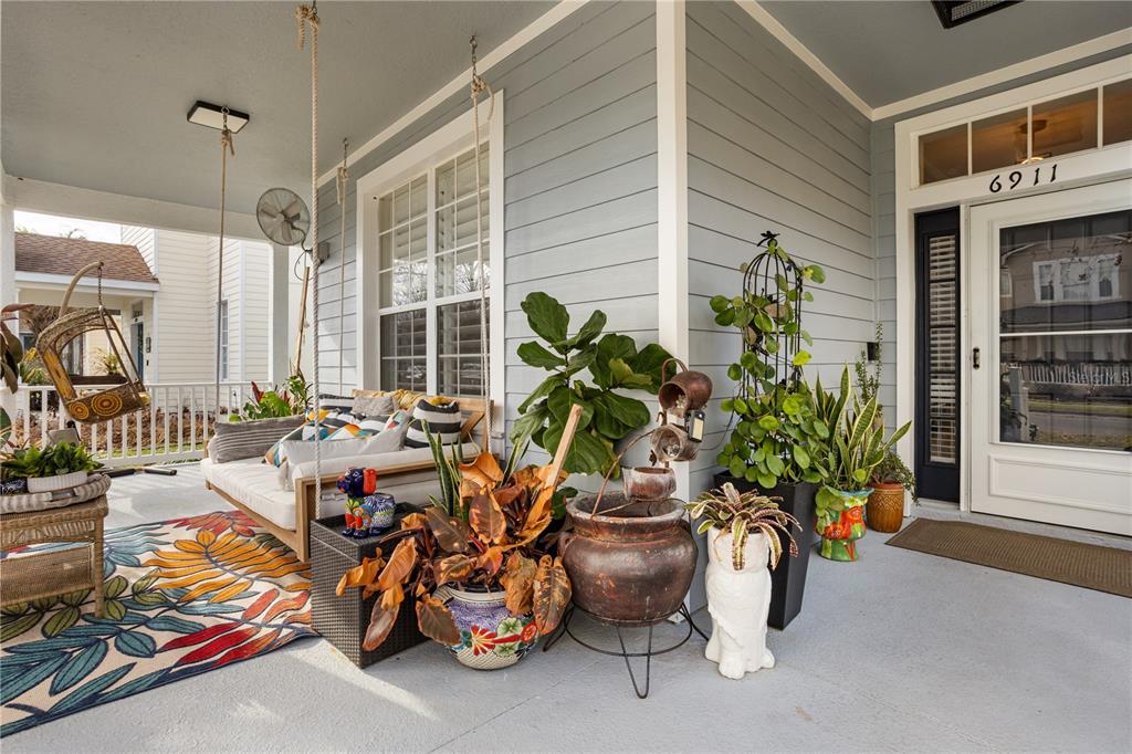 6911 Beargrass Road Harmony, FL 34773 - Photo 4 of 60 a view of yard with patio