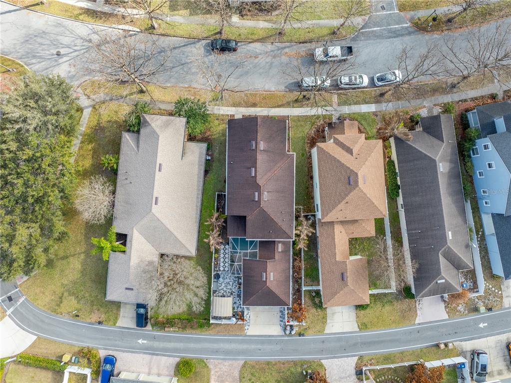 6911 Beargrass Road Harmony, FL 34773 - Photo 46 of 60 an aerial view of residential houses with outdoor space