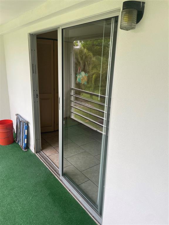 387 Tilford R, Unit 387 Deerfield Beach, FL 33442 - Photo 13 of 53 a view of outdoor space