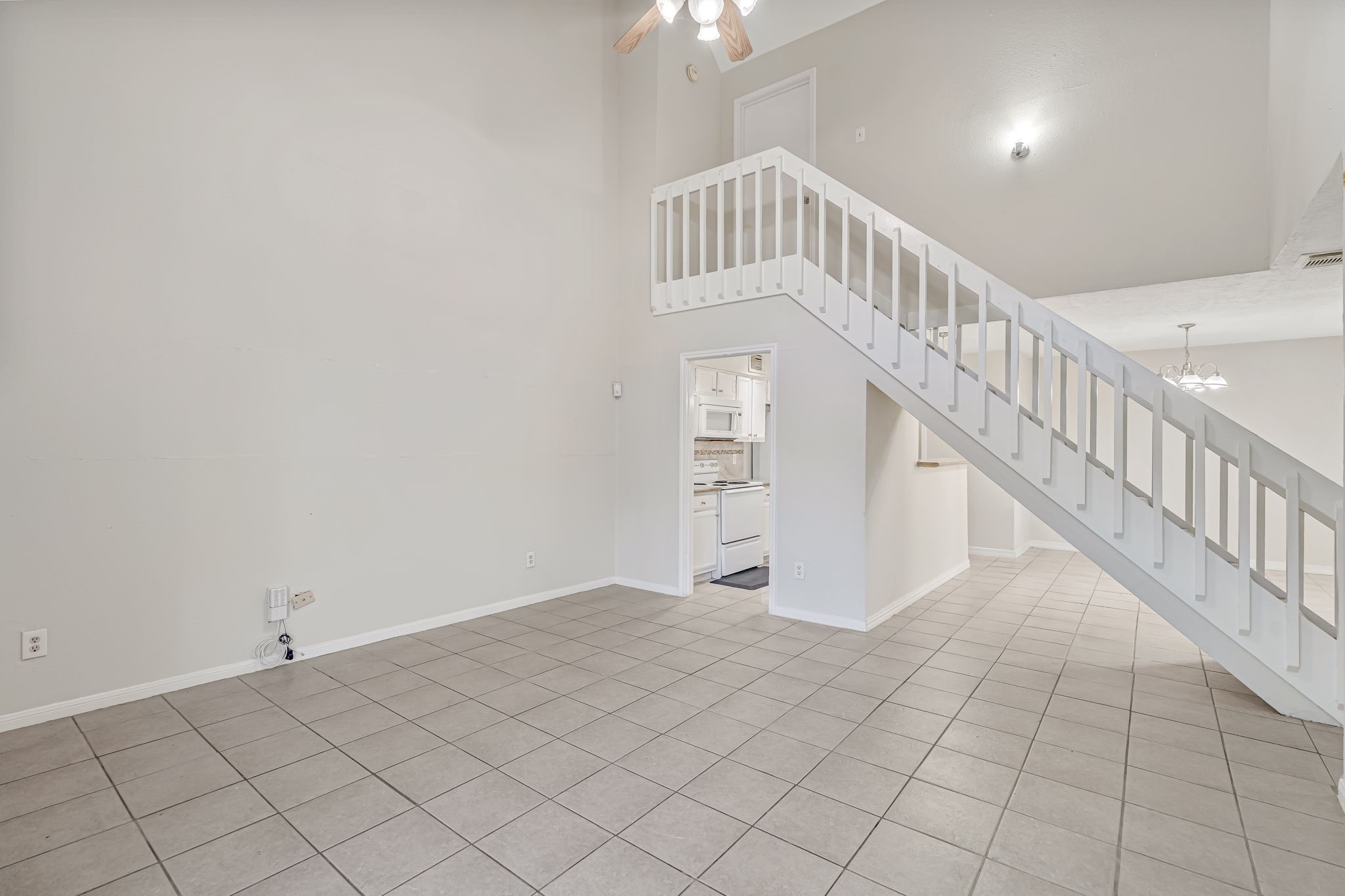 16722 Shrub Oak Drive Humble, TX 77396 - Photo 12 of 30 a view of staircase with white walls and white walls