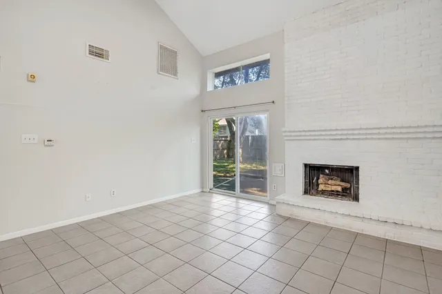 a view of entryway and hall with a window
