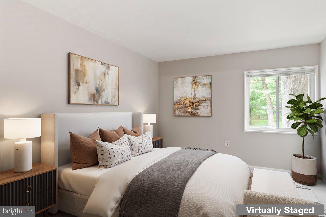 1422 Northgate Square, Unit 12B Reston, VA 20190 - Photo 13 of 36 Primary Bedroom - Virtually Staged