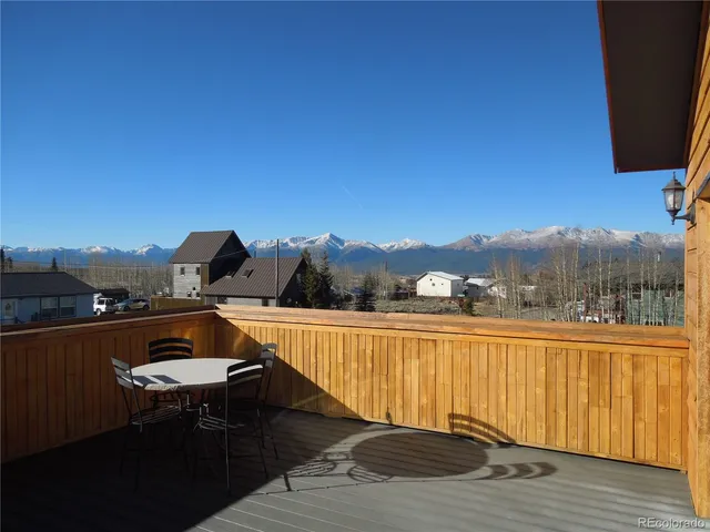 a view of balcony with furniture