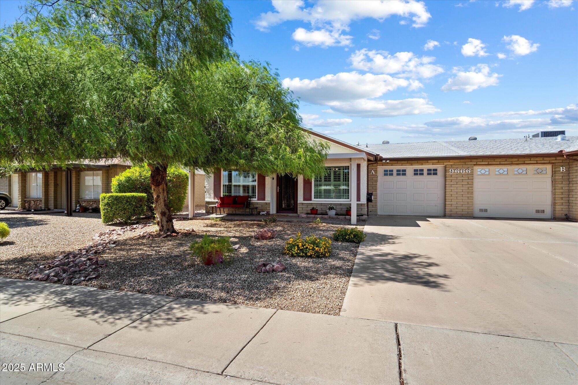 9666 West Mountain View Road, Unit A Peoria, AZ 85345 - Photo 1 of 22 Charming + Lush Mountain View A