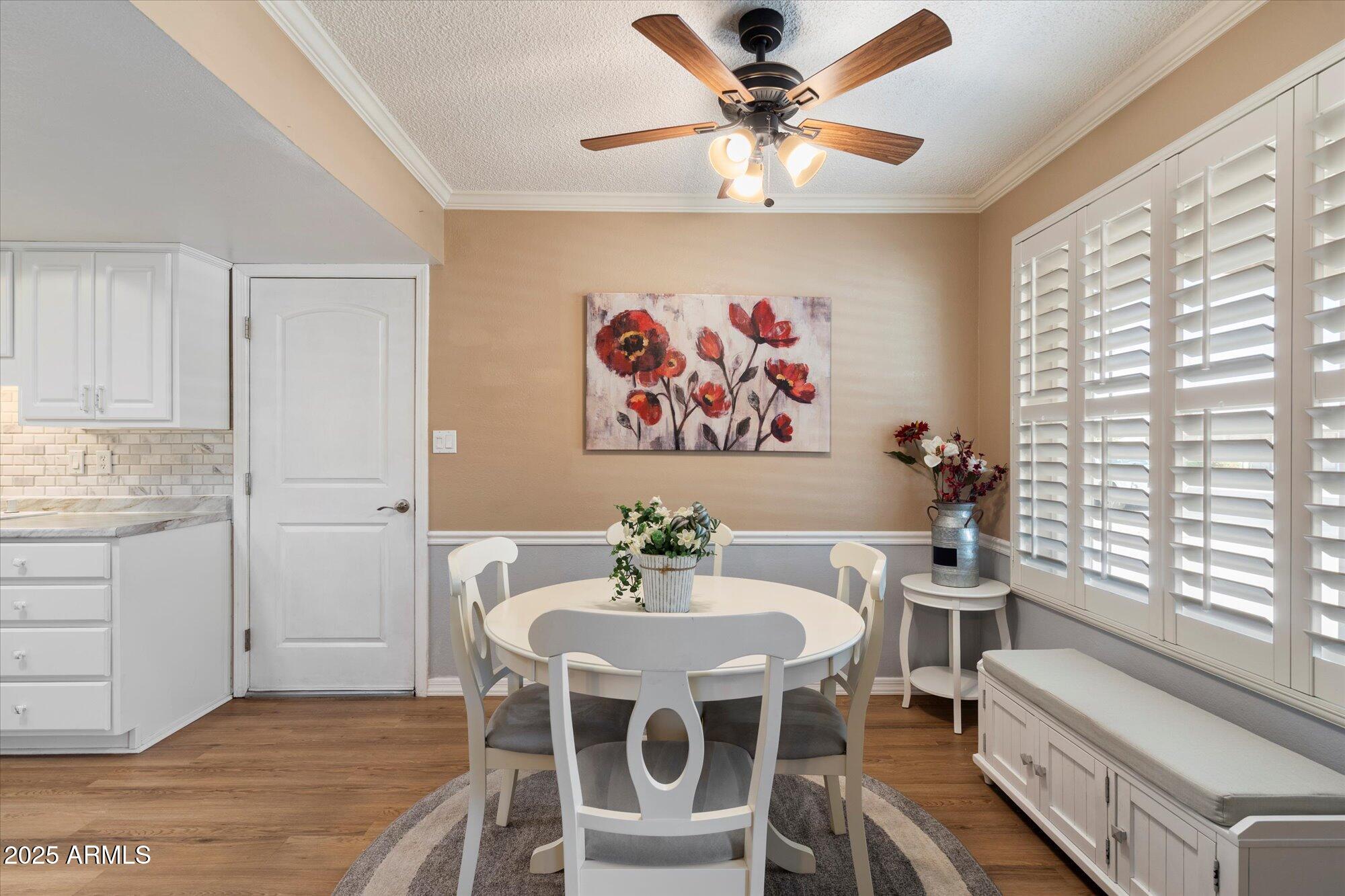 9666 West Mountain View Road, Unit A Peoria, AZ 85345 - Photo 7 of 22 Eat-In Kitchen Open to Front Yard