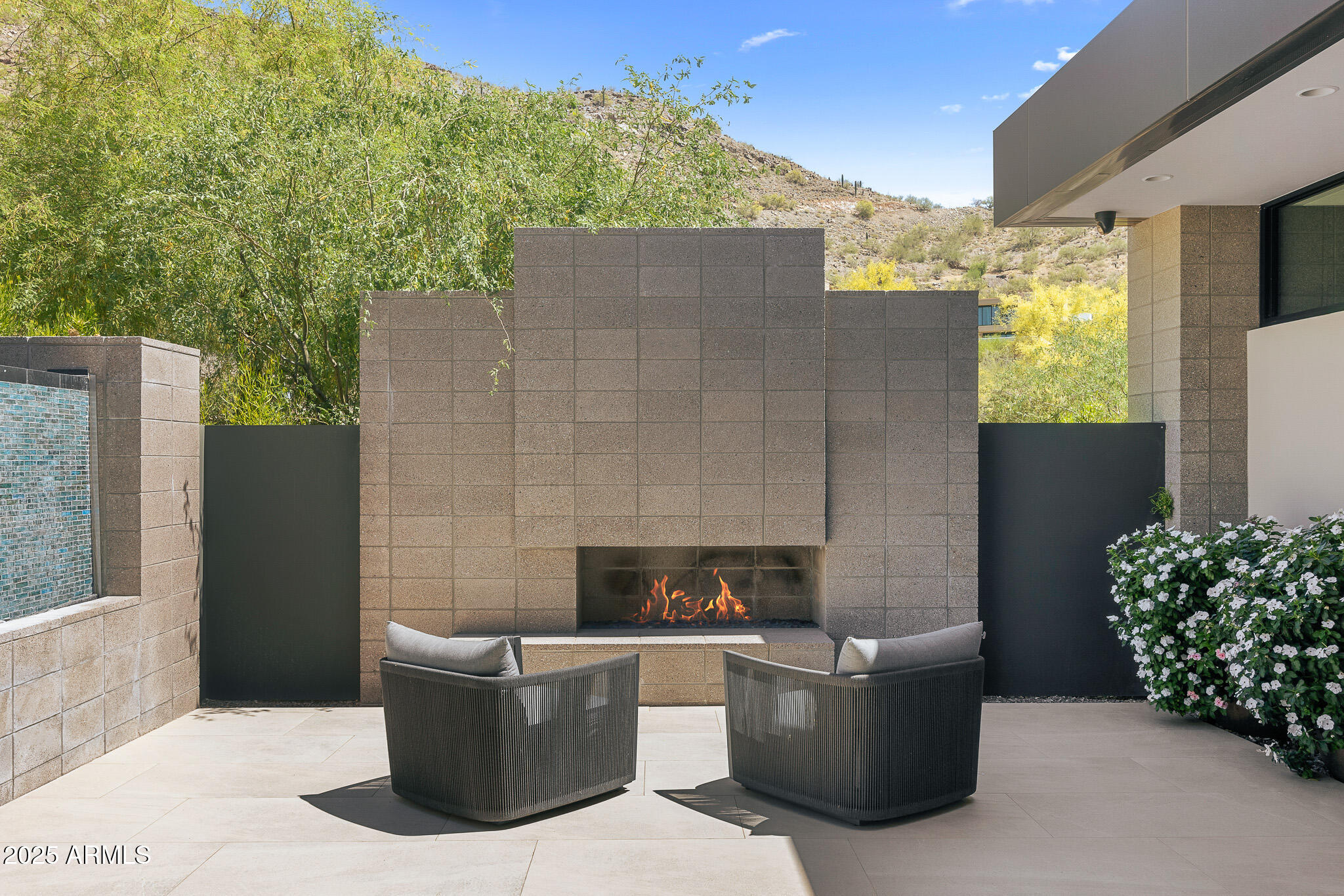 6149 East Indian Bend Road Paradise Valley, AZ 85253 - Photo 69 of 77 a living room with furniture and a potted plant