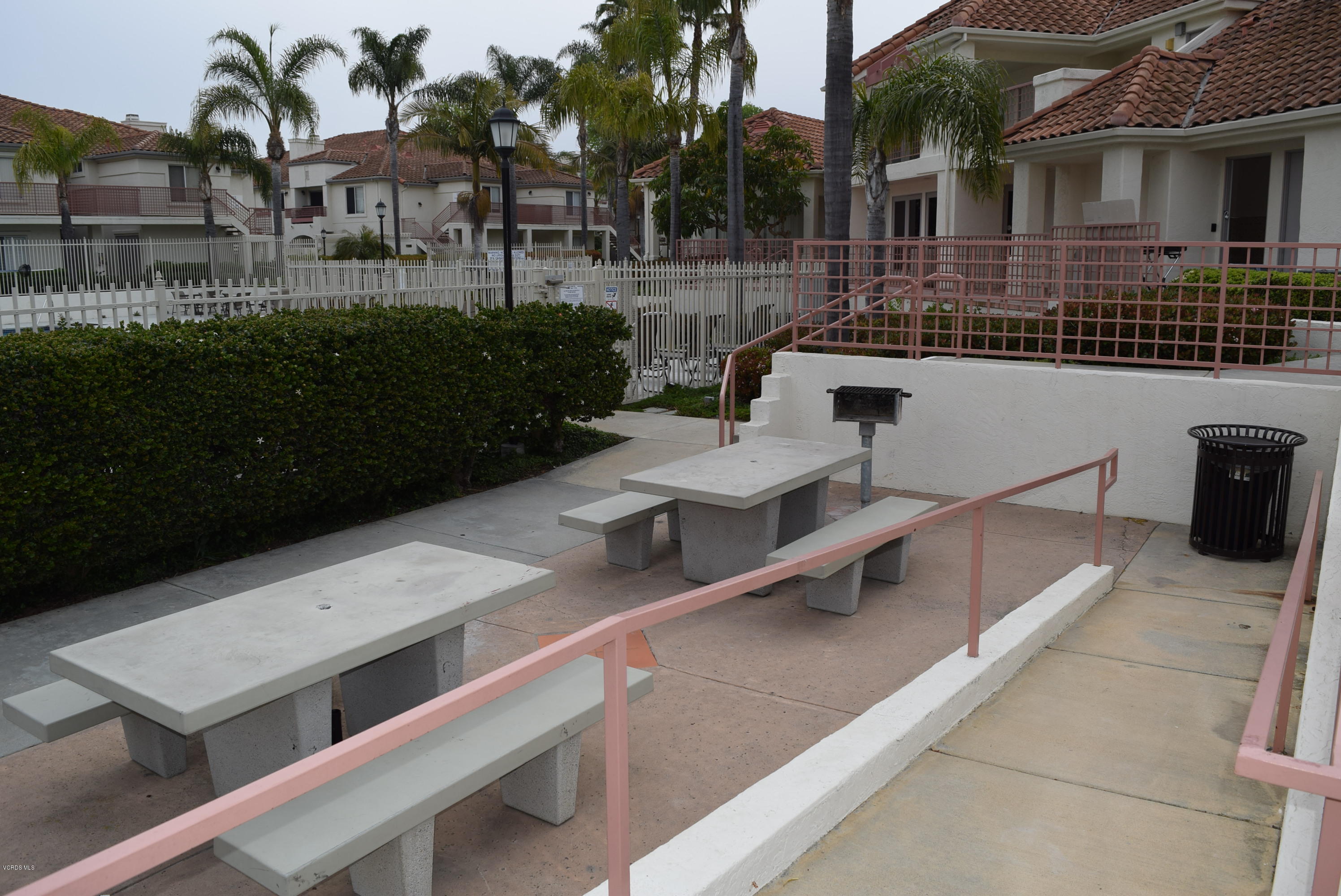 540 Ribbon Beach Way, Unit 296 Oceanside, CA 92058 - Photo 15 of 28 a view of a patio with couches table and chairs and potted plants