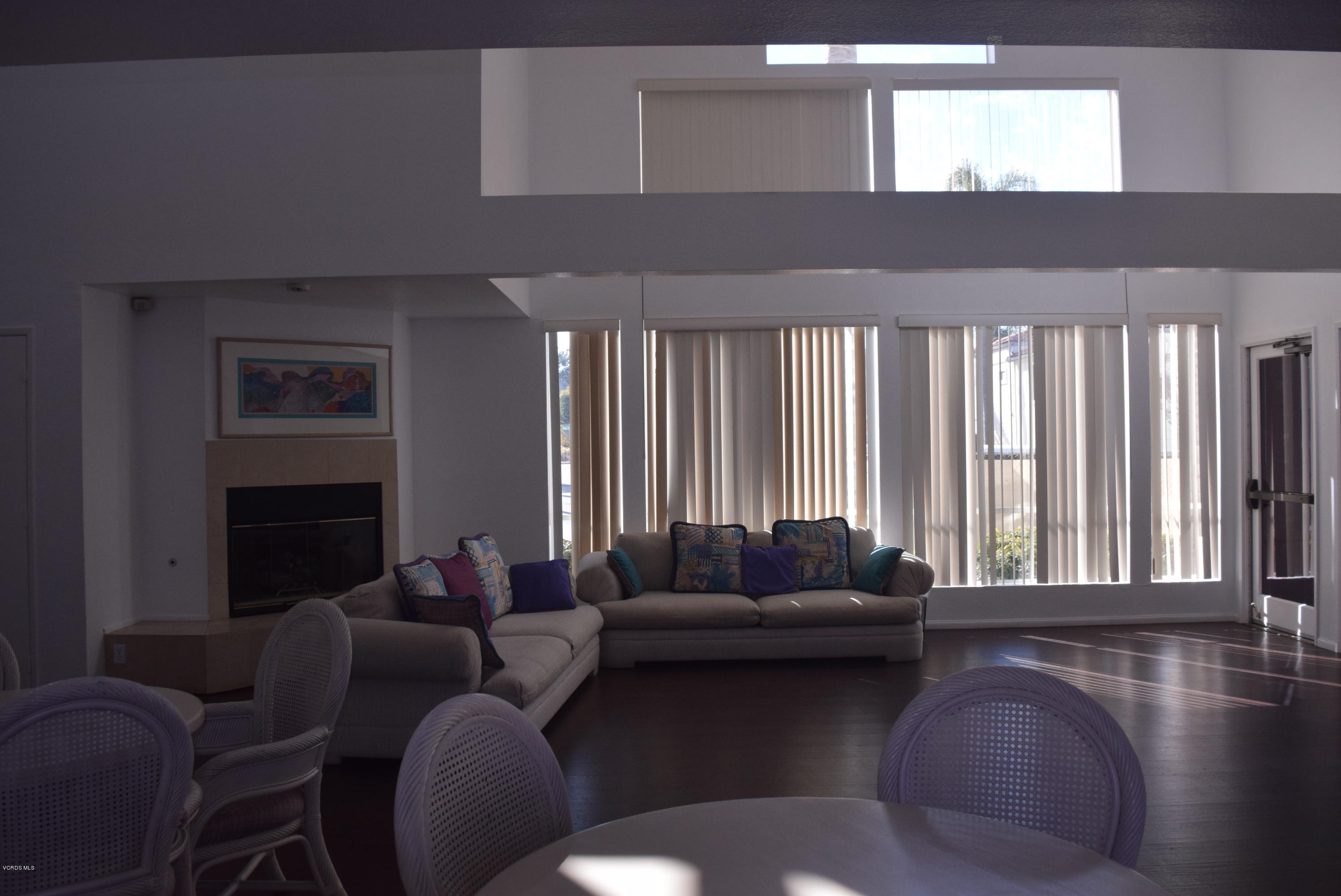 540 Ribbon Beach Way, Unit 296 Oceanside, CA 92058 - Photo 22 of 28 a living room with furniture and a fireplace