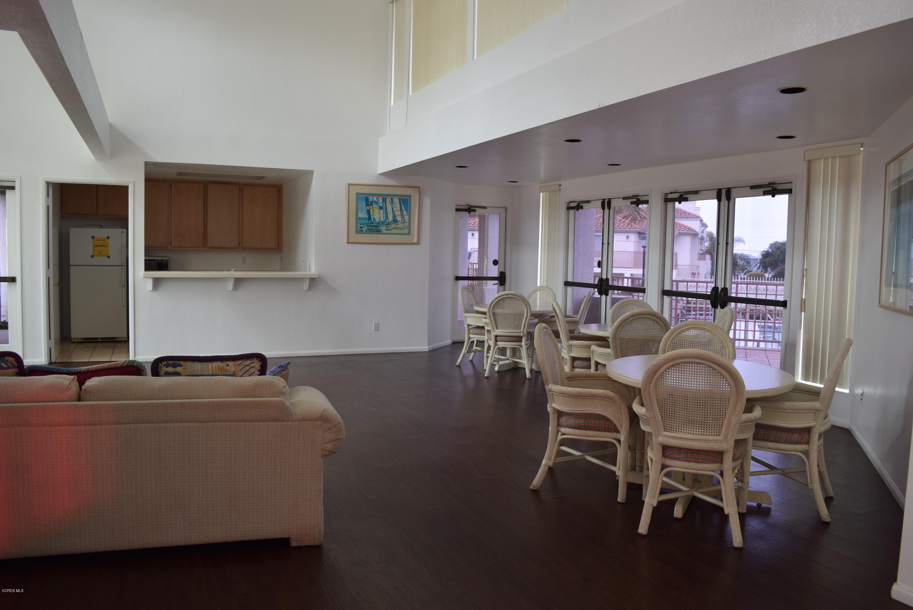 540 Ribbon Beach Way, Unit 296 Oceanside, CA 92058 - Photo 23 of 28 a dining room with furniture and window