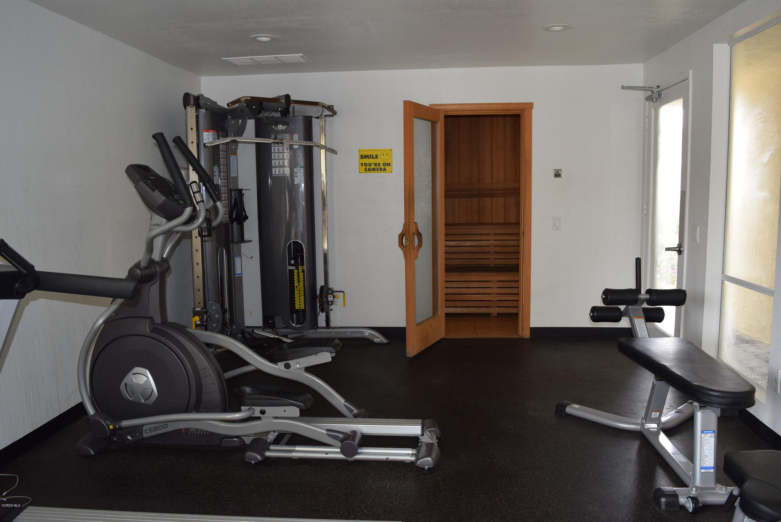 540 Ribbon Beach Way, Unit 296 Oceanside, CA 92058 - Photo 25 of 28 a room with gym equipment