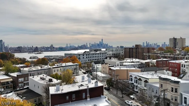 a view of city with ocean