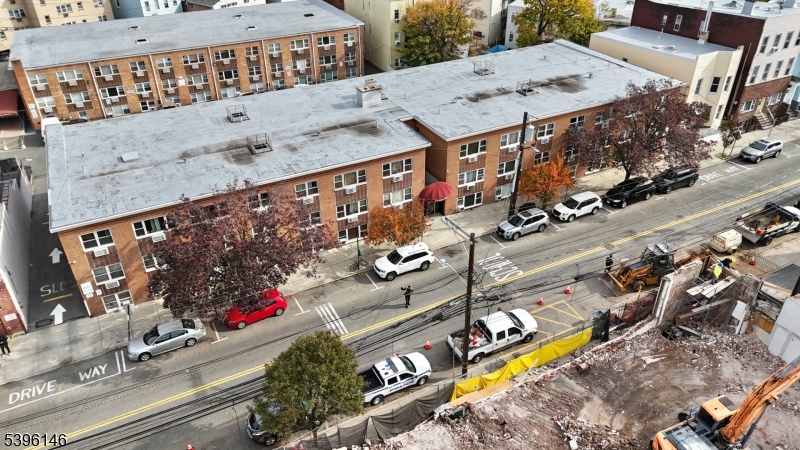 114 32nd Street, Unit 30 Union City, NJ 07087 - Photo 19 of 20 an aerial view of a swimming pool with outdoor seating space