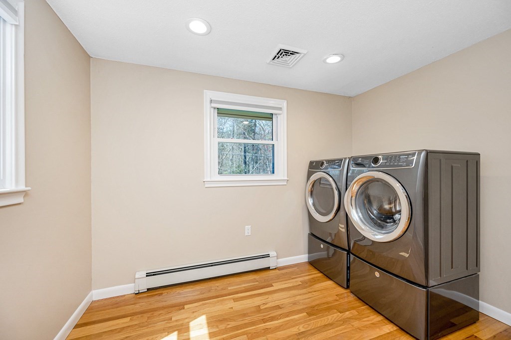 23 Lane Road Pelham, NH 03076 - Photo 14 of 42 a view of empty room with window and washing machine