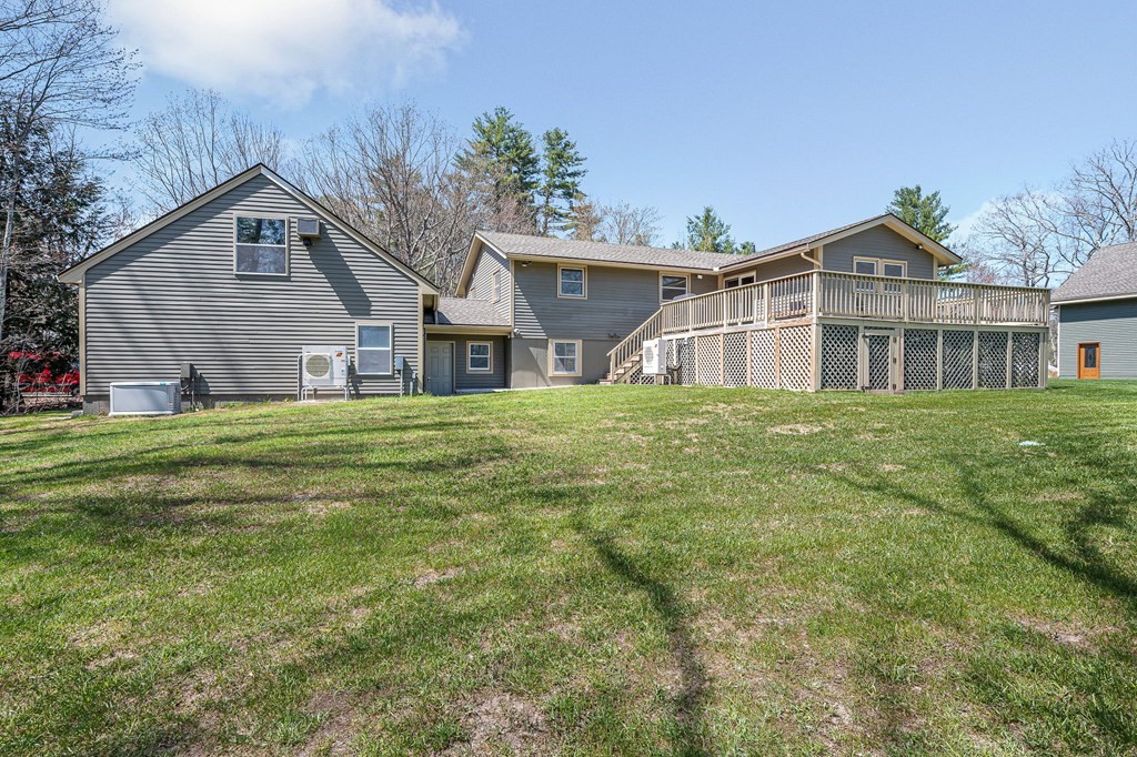 23 Lane Road Pelham, NH 03076 - Photo 32 of 42 a view of a house with a yard