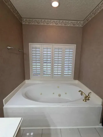 a bathroom with a bathtub