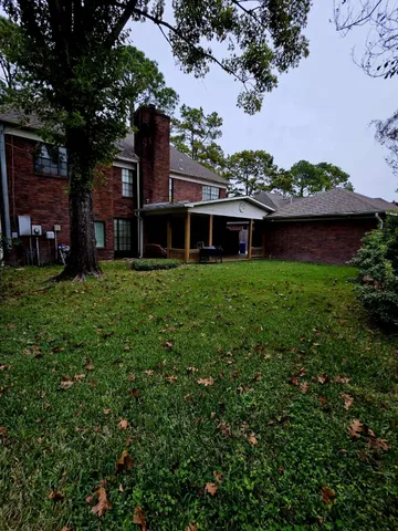 a view of backyard with green space
