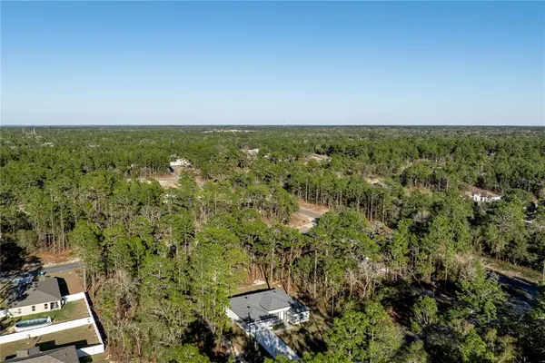 an aerial view of a city with lots of residential buildings