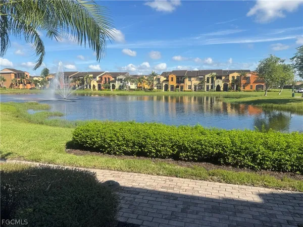 a view of a lake with a big yard