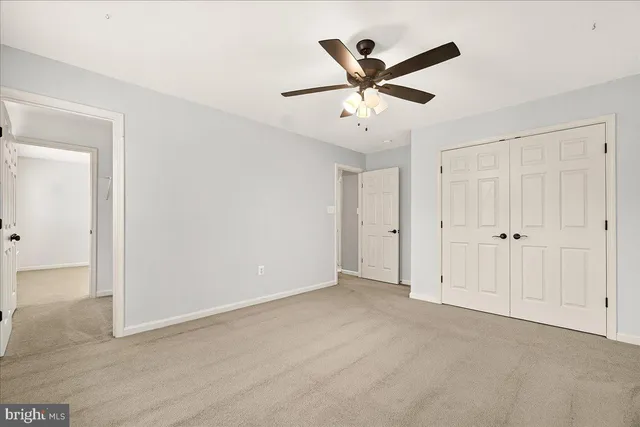 a bathroom with a sink double vanity and a mirror