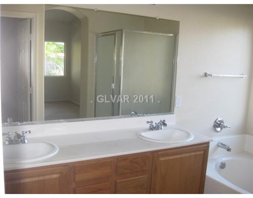 8951 Manhattan Road Henderson, NV 89074 - Photo 6 of 14 Master Bath/Spa. Master vanity and double sink