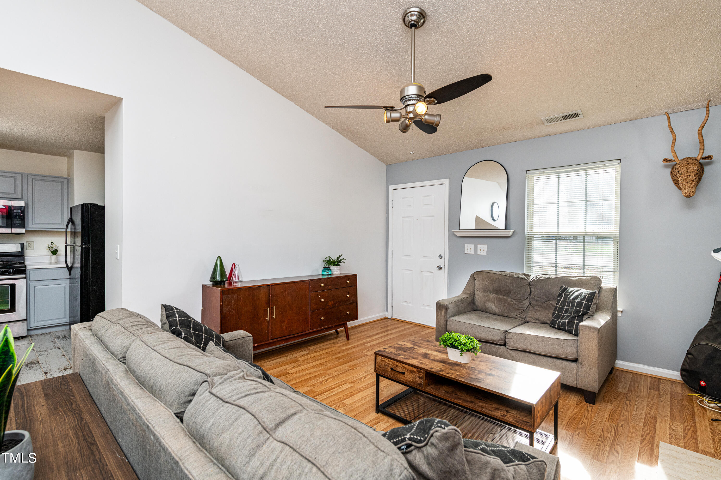 4225 Lake Woodard Drive Raleigh, NC 27604 - Photo 11 of 27 a living room with furniture