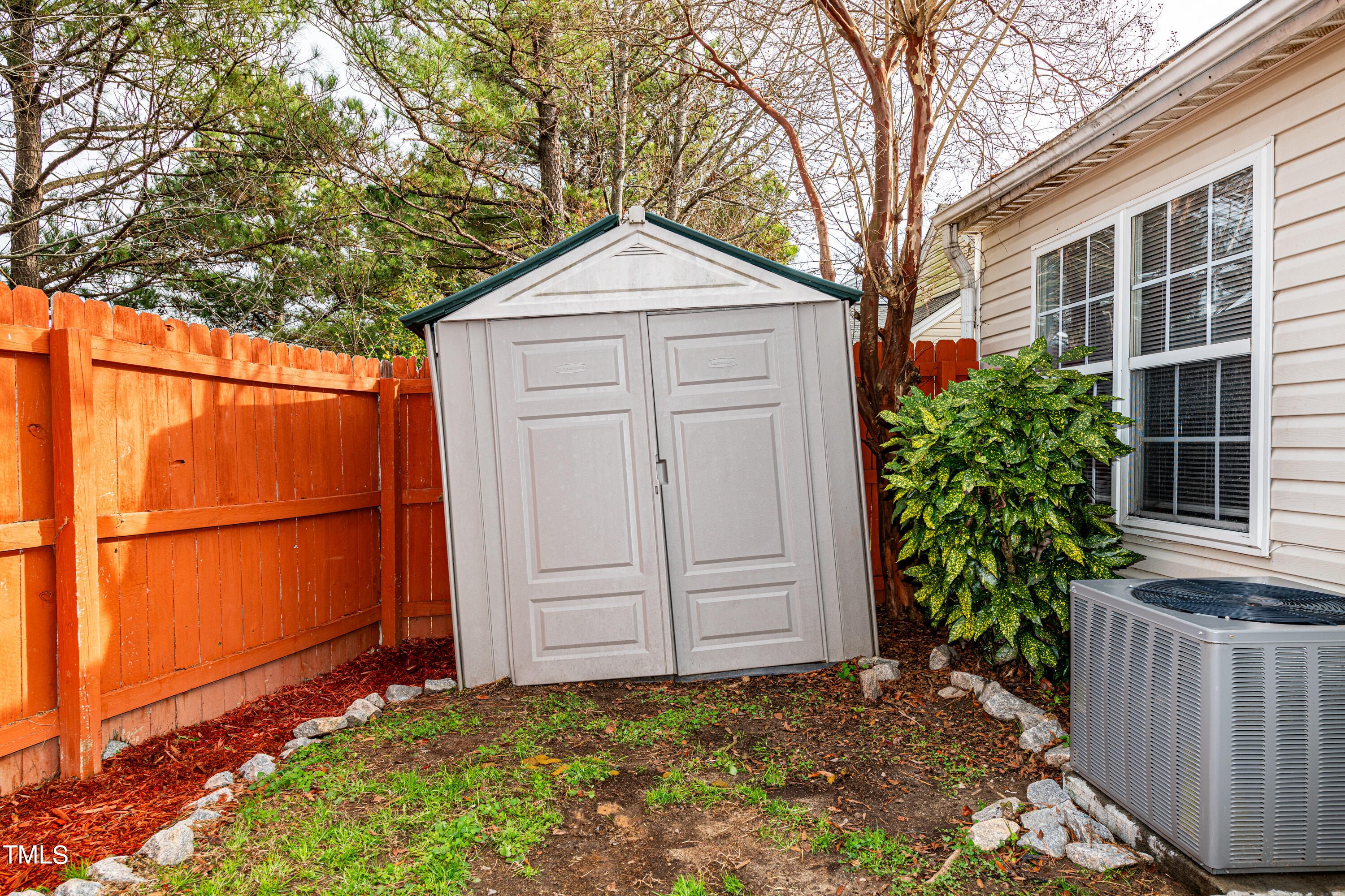 4225 Lake Woodard Drive Raleigh, NC 27604 - Photo 25 of 27 a front view of a house with a yard