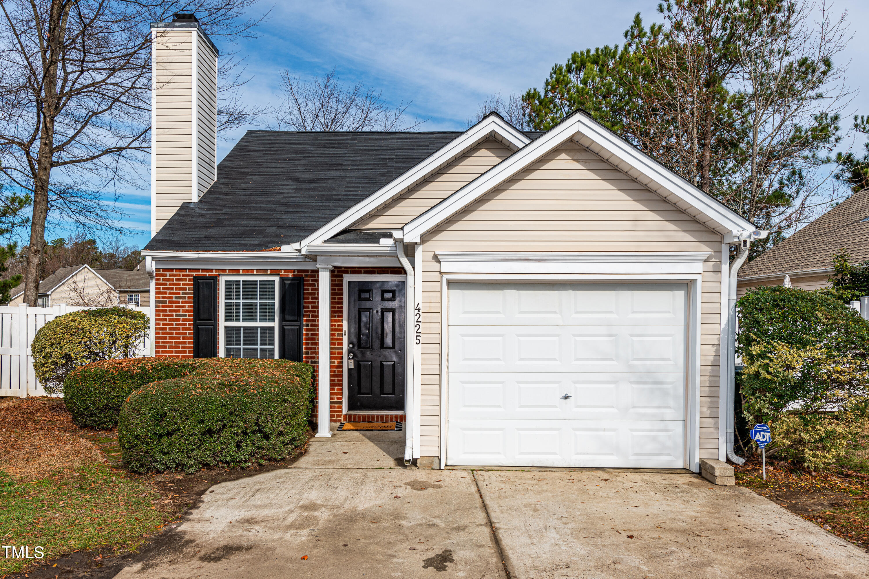 4225 Lake Woodard Drive Raleigh, NC 27604 - Photo 26 of 27 a view of a house with a garage