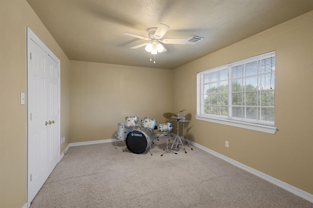 8049 Sunscape Lane Fort Worth, TX 76123 - Photo 27 of 37 a very nice looking room with a window