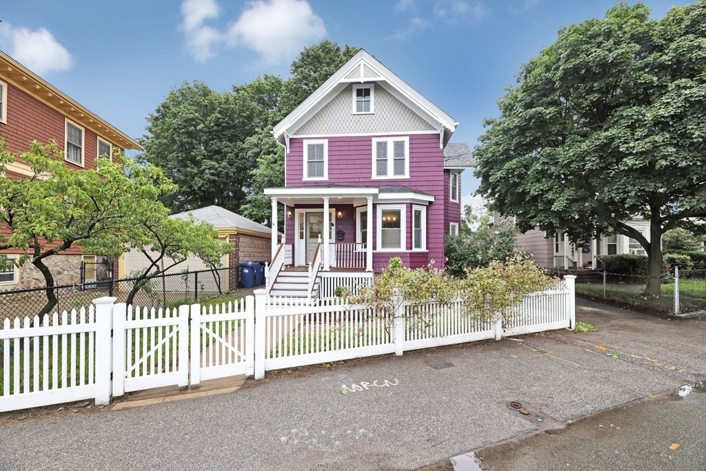 79 Harvard Avenue Boston, MA 02136 - Photo 1 of 33 a front view of a house with a garden