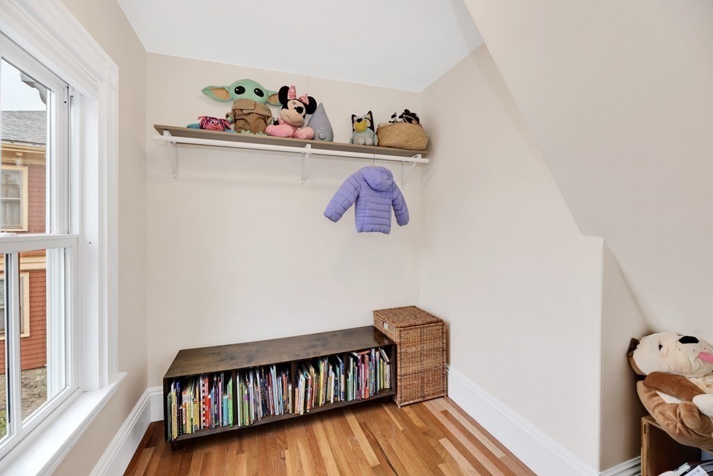 79 Harvard Avenue Boston, MA 02136 - Photo 18 of 33 a view of hallway with window and toys