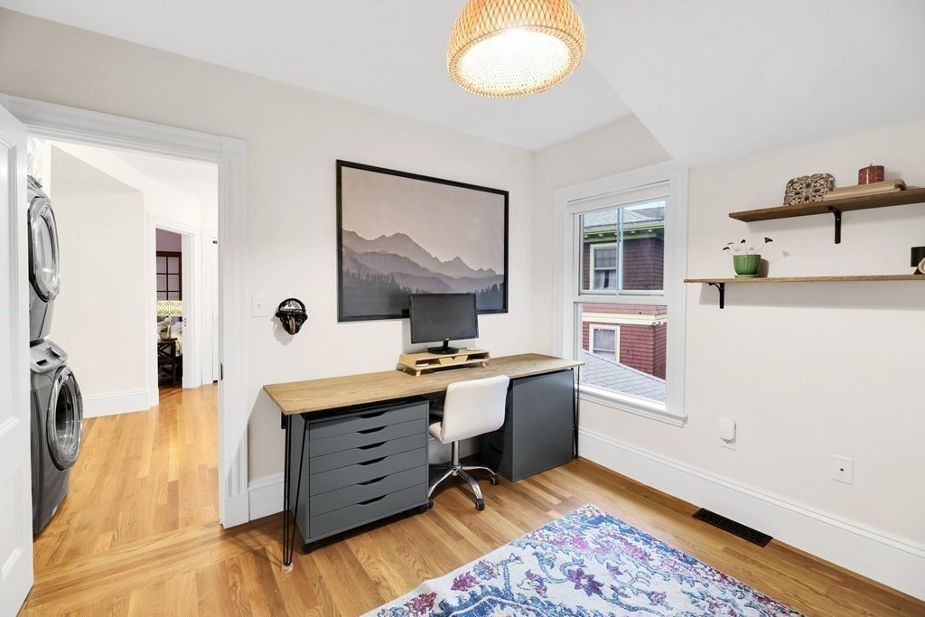 79 Harvard Avenue Boston, MA 02136 - Photo 19 of 33 a view of workspace with wooden floor